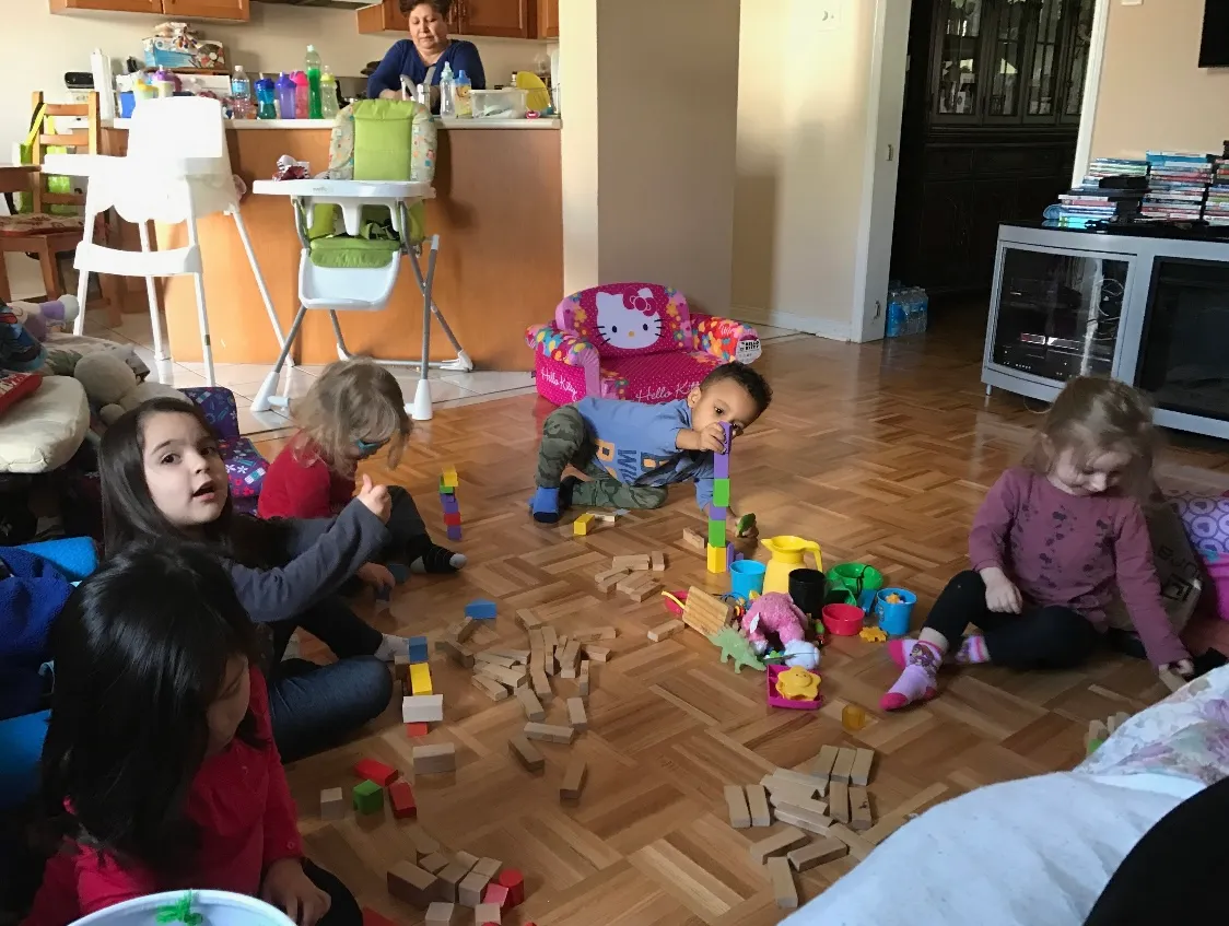 Photo of daycare kids playing with blocks